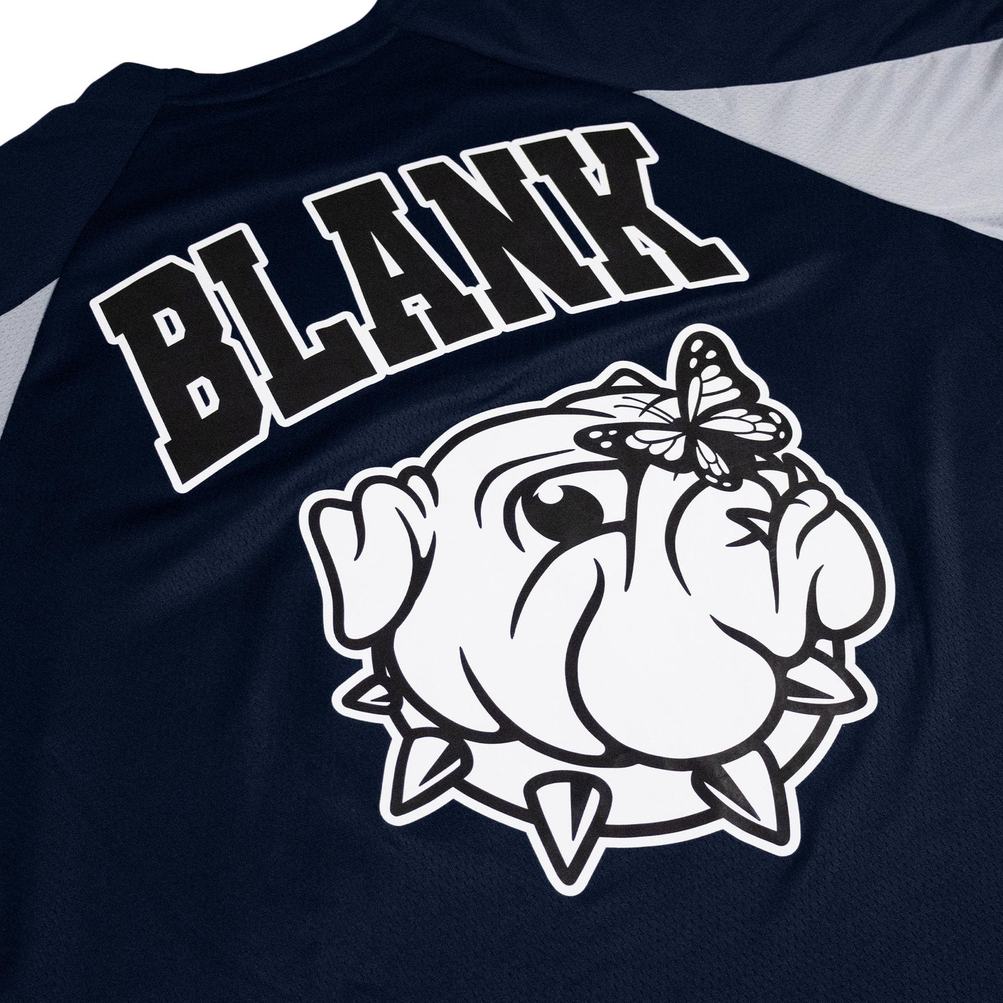 Butterfly perched on bulldog graphic on football jersey in navy color