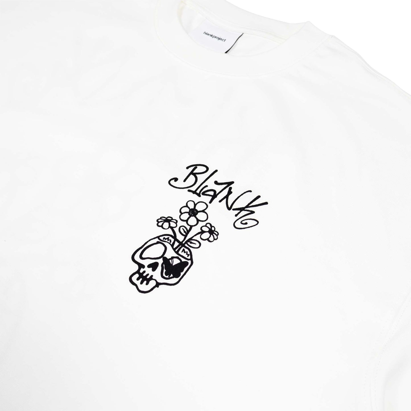 Blank Project Flower and Skull graphic on a white t shirt in white color