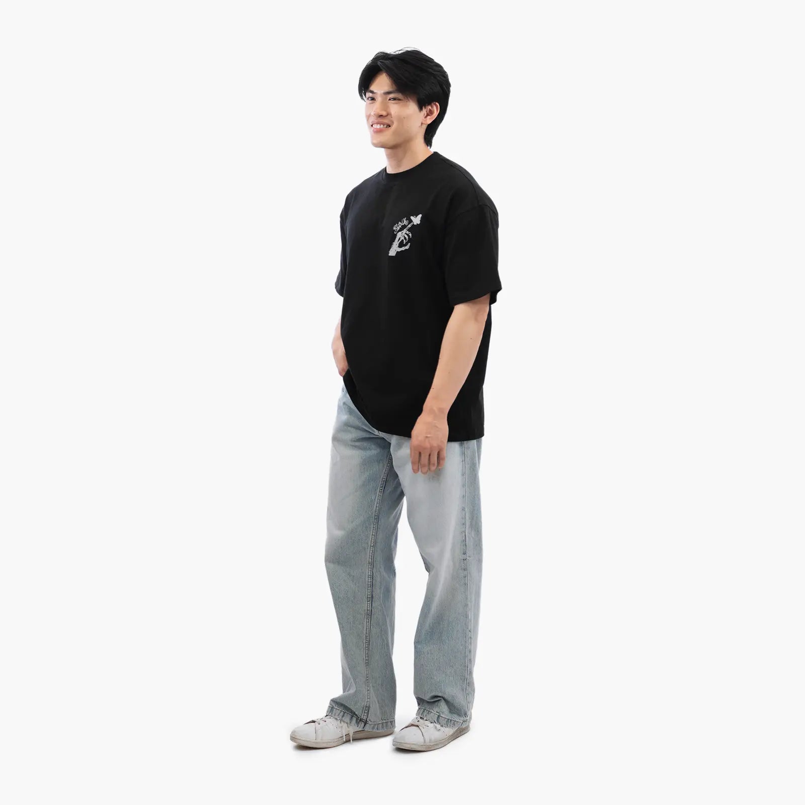 Model wears Blank Project Skeleton Hand Graphic Short Sleeve T-Shirt in black color