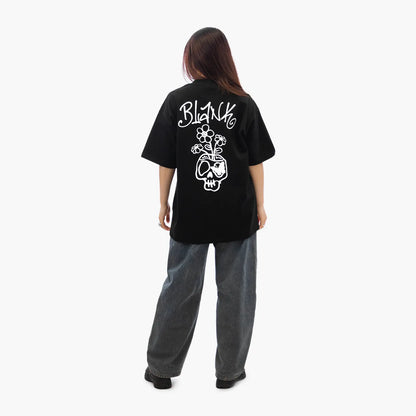 Model wears Blank Project Flower Skull Graphic Short Sleeve T-Shirt in Black Color